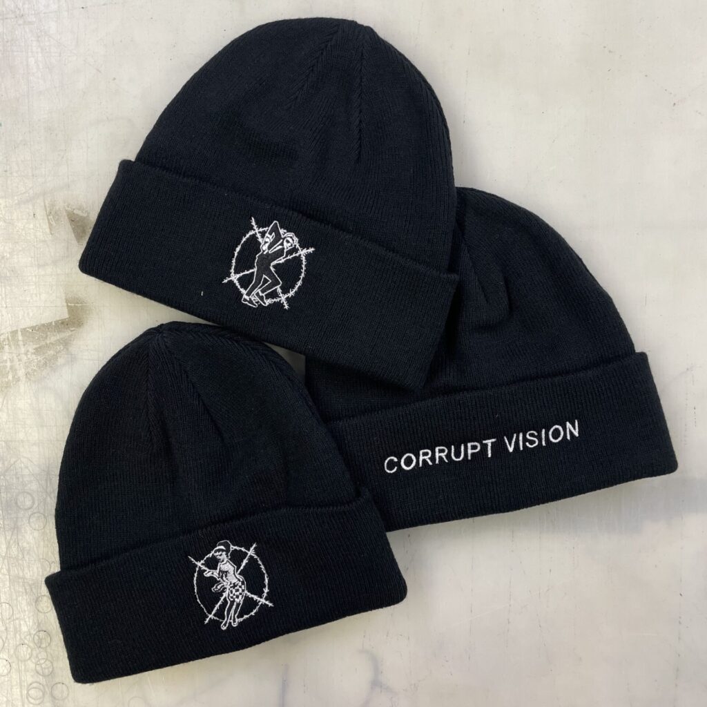 Trio of cuffed beanies with embroidered band logos